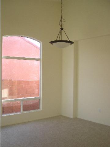 393 Via Capri Rio Rico, AZ 85648 - Photo 2 of 9 a room that has a window in it