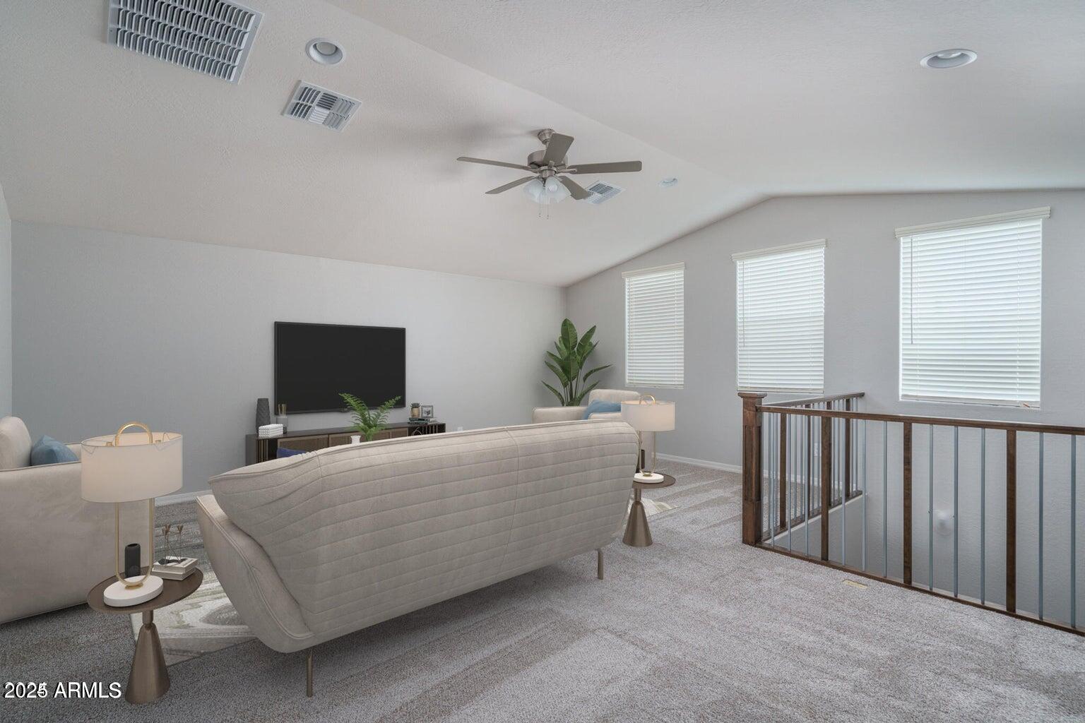 16172 West Alameda Road Surprise, AZ 85387 - Photo 15 of 53 a living room with furniture a flat screen tv and a window