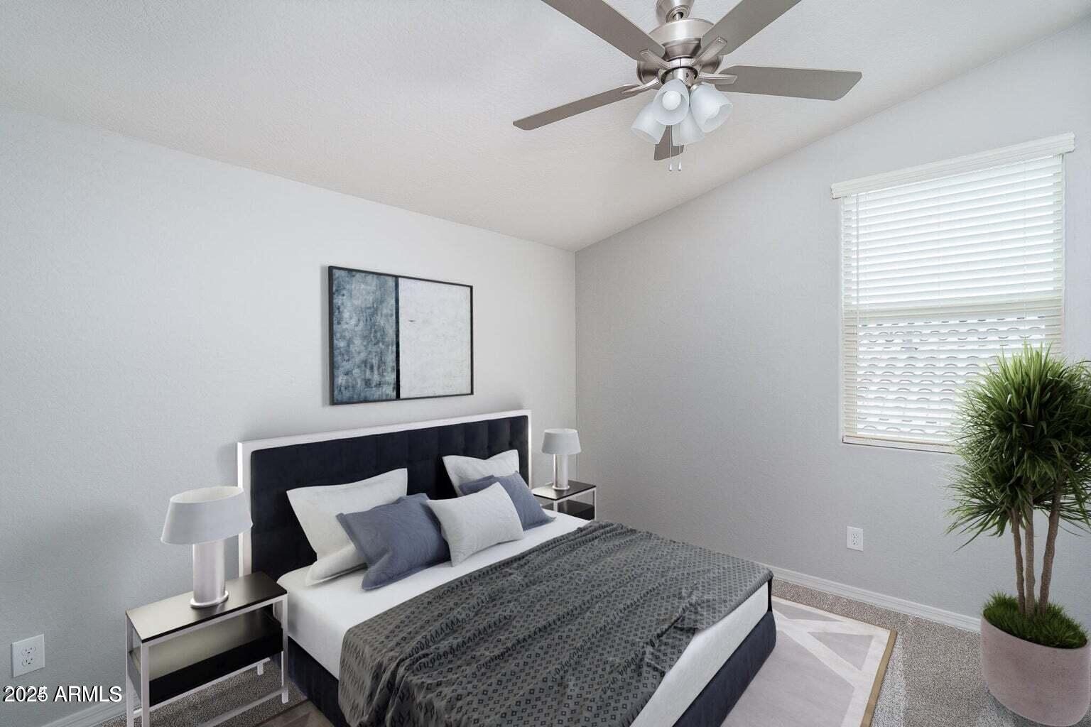 16172 West Alameda Road Surprise, AZ 85387 - Photo 19 of 53 a bedroom with a large bed and a potted plant