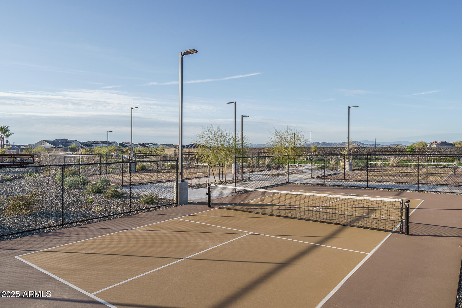 16172 West Alameda Road Surprise, AZ 85387 - Photo 33 of 53 a view of a tennis court with projector