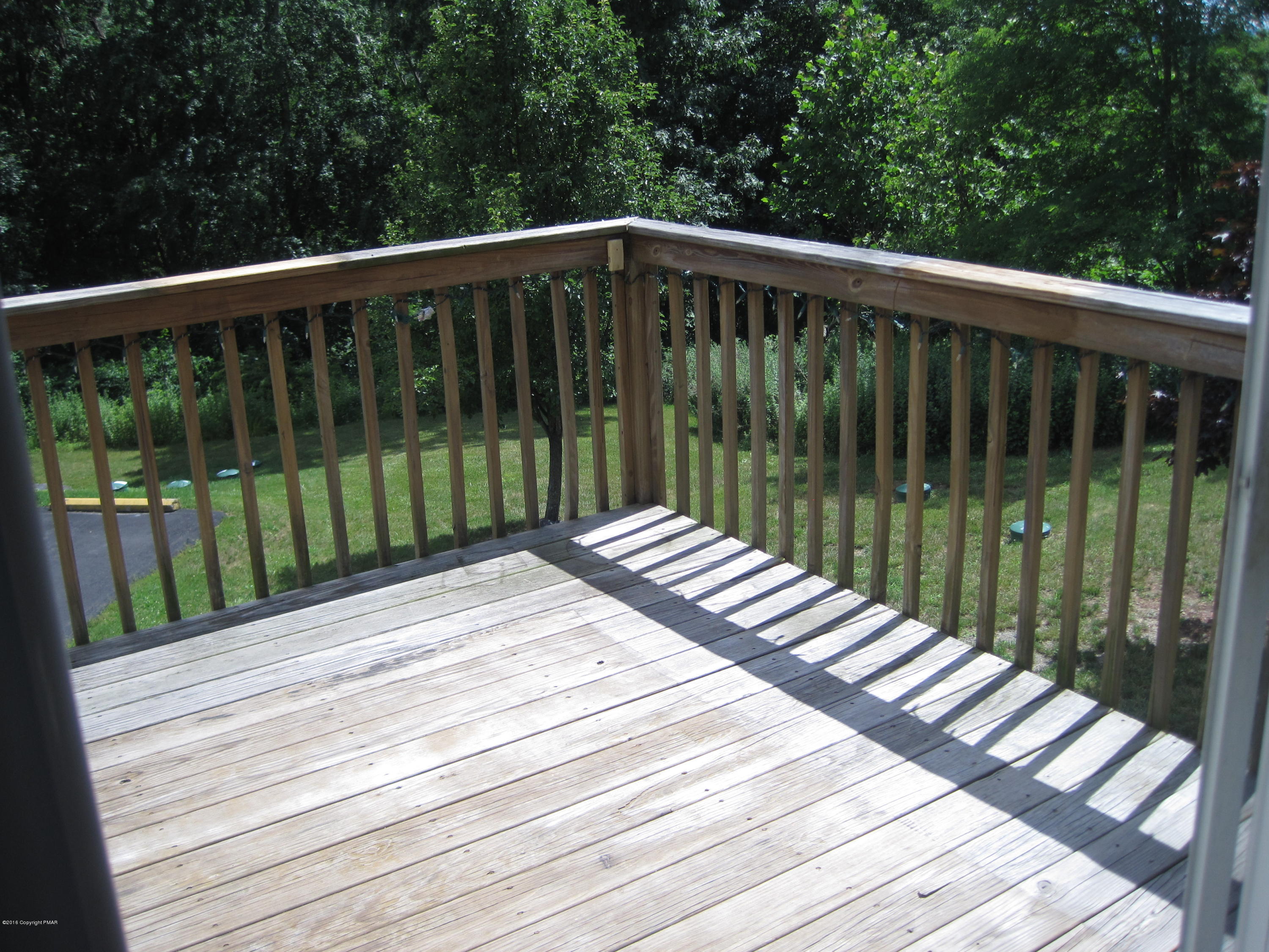 60 Lower Ridgeview Circle East Stroudsburg, PA 18302 - Photo 12 of 12 a view of a wooden roof deck