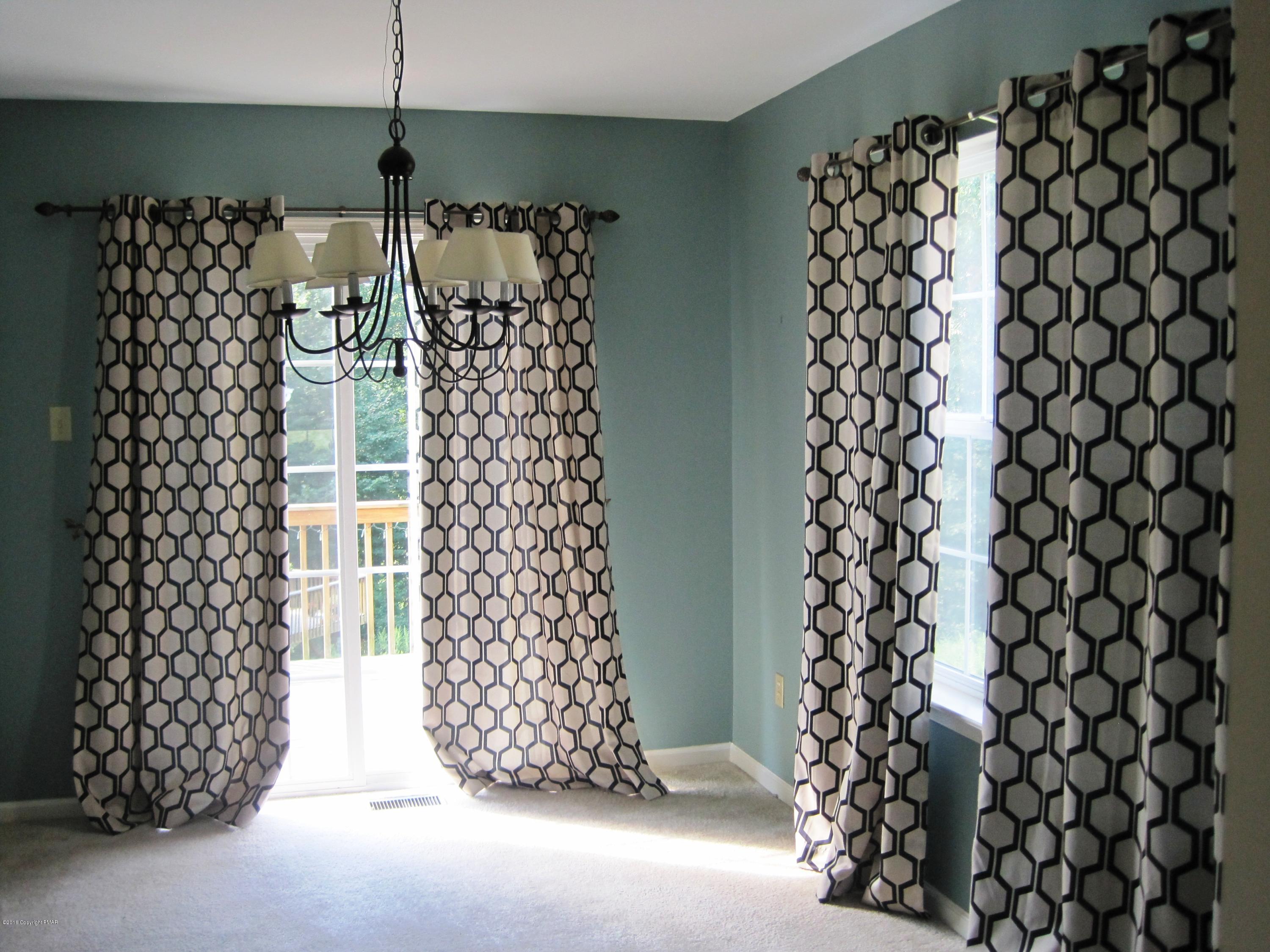 60 Lower Ridgeview Circle East Stroudsburg, PA 18302 - Photo 4 of 12 a bathroom with a shower curtain