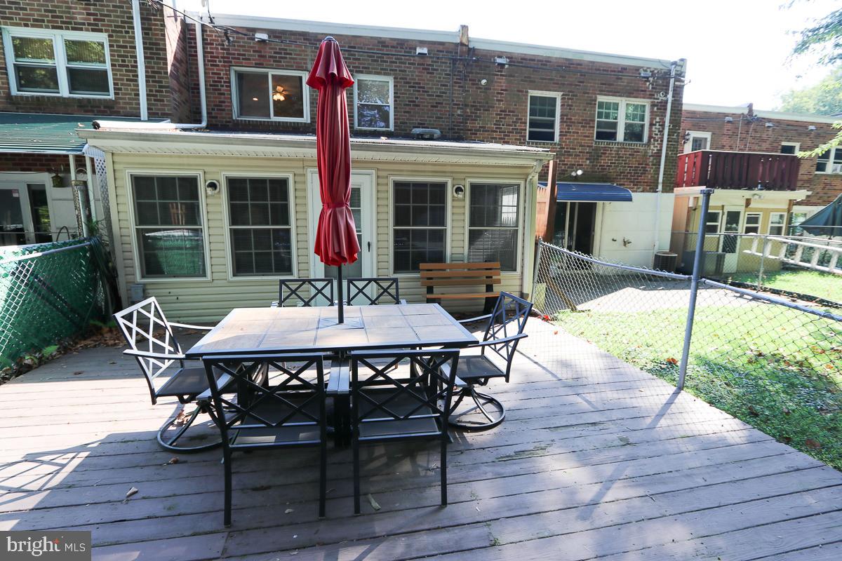 3242 Rhett Road Philadelphia, PA 19154 - Photo 54 of 58 a view of a patio with table and chairs