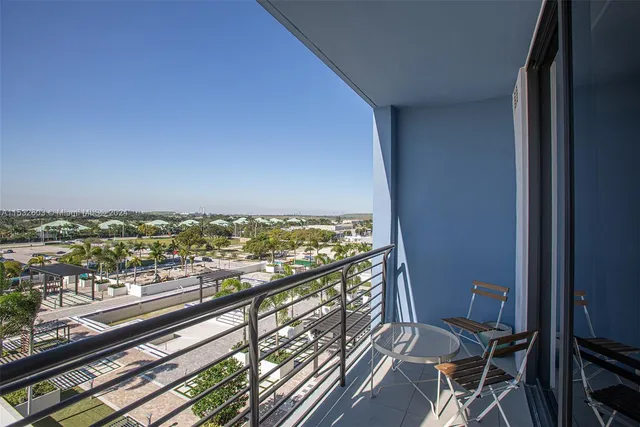 a view of a balcony with city view