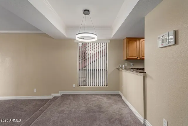 a view of a livingroom with a staircase