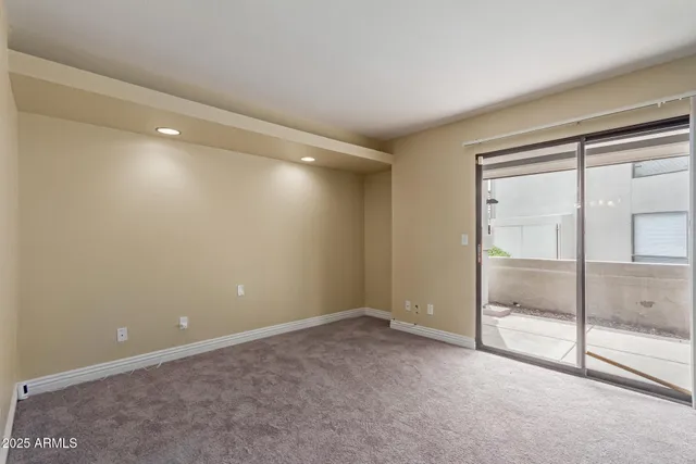 a view of an empty room with window