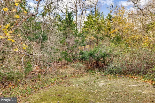 an aerial view of residential house with parking space