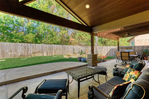 a view of an outdoor sitting area with furniture