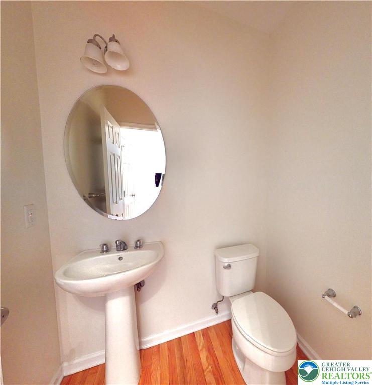 1824 Big Ridge Drive East Stroudsburg, PA 18302 - Photo 20 of 46 a bathroom with a toilet sink and mirror