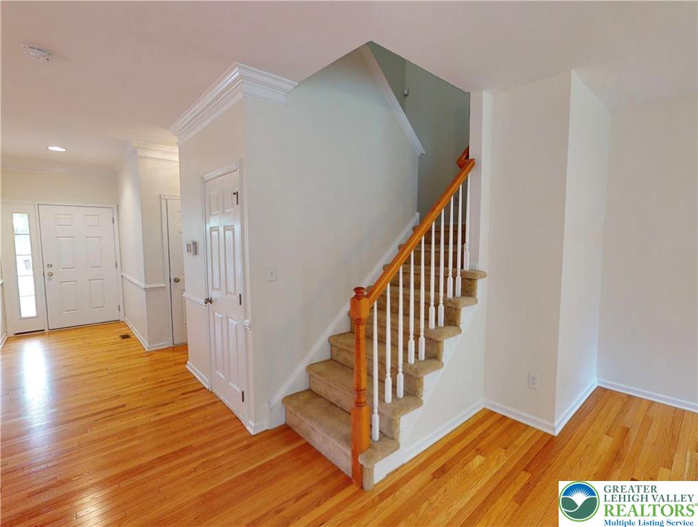 1824 Big Ridge Drive East Stroudsburg, PA 18302 - Photo 21 of 46 a view of a hallway with wooden floor and staircase