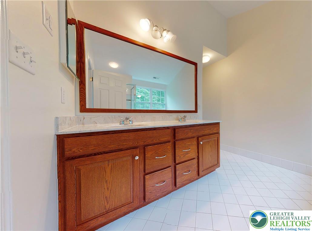 1824 Big Ridge Drive East Stroudsburg, PA 18302 - Photo 31 of 46 a bathroom with a sink and a mirror