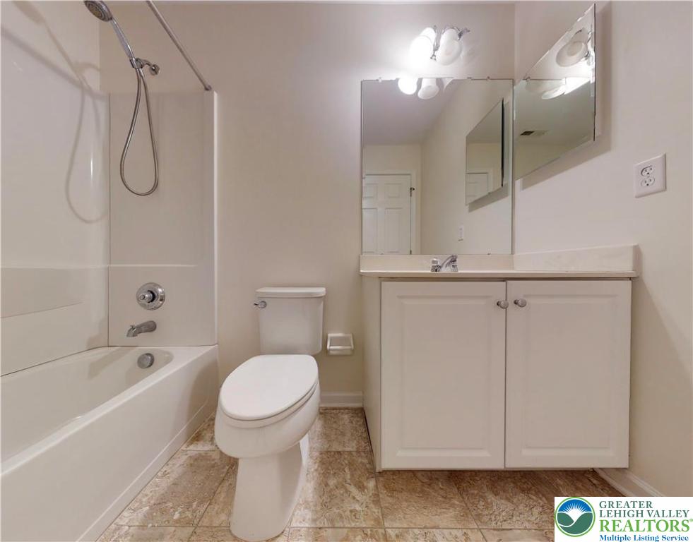 1824 Big Ridge Drive East Stroudsburg, PA 18302 - Photo 35 of 46 a bathroom with a toilet sink and shower