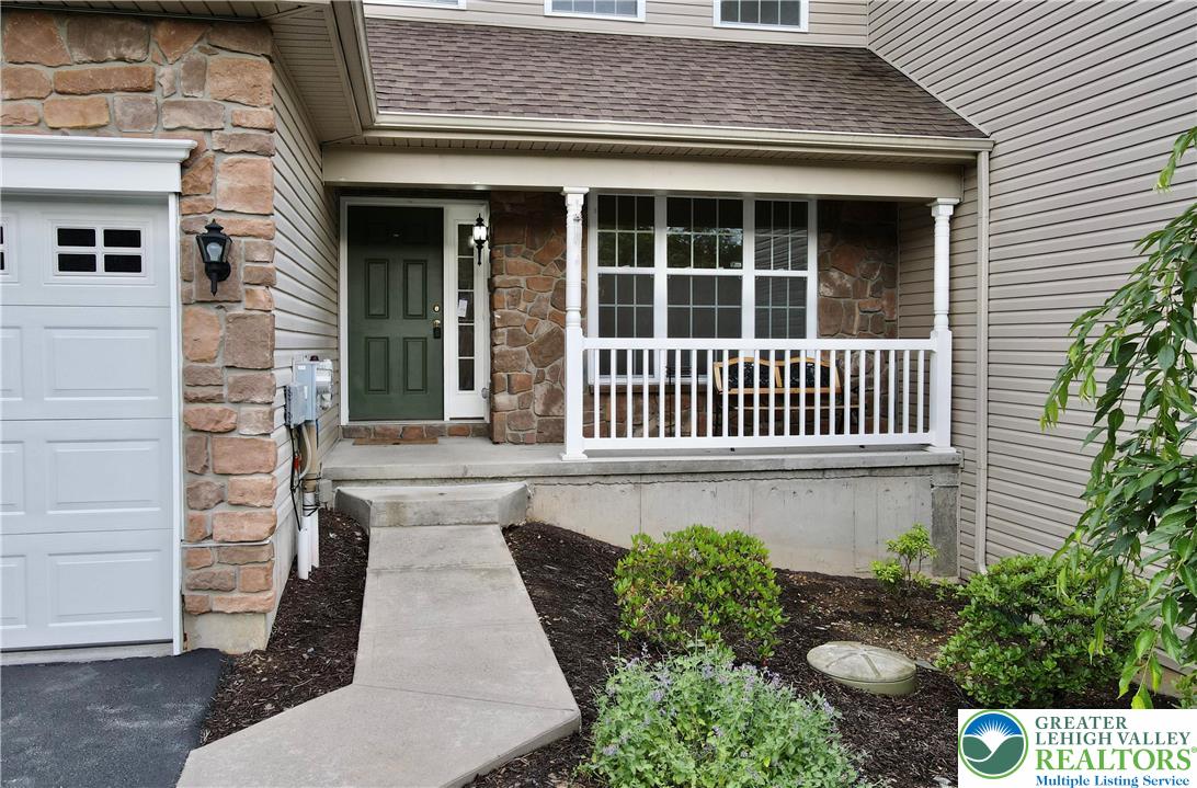 1824 Big Ridge Drive East Stroudsburg, PA 18302 - Photo 5 of 46 a view of a house with a small yard and wooden floor and fence