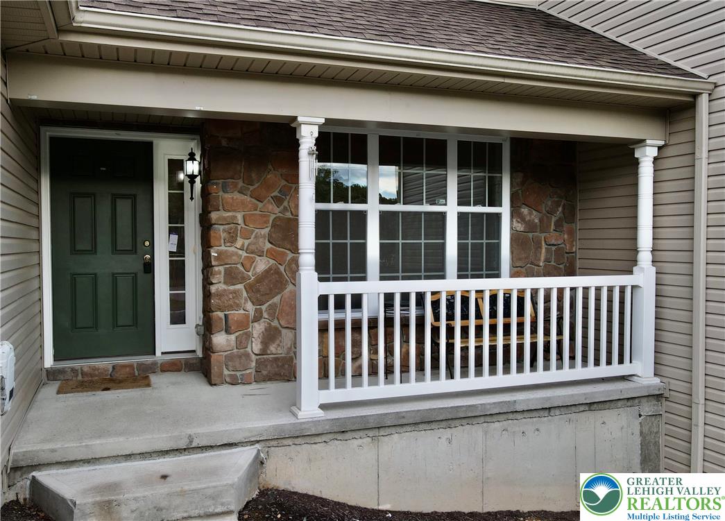1824 Big Ridge Drive East Stroudsburg, PA 18302 - Photo 6 of 46 a view of a brick house with a window