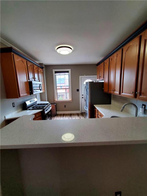 905 Deely Street Pittsburgh, PA 15217 - Photo 11 of 19 a kitchen with a refrigerator and window