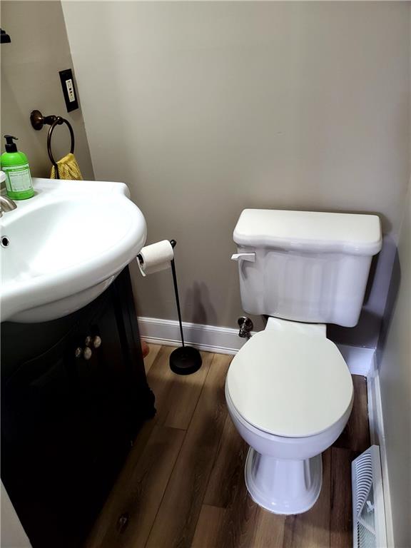 905 Deely Street Pittsburgh, PA 15217 - Photo 13 of 19 a bathroom with a toilet and a sink