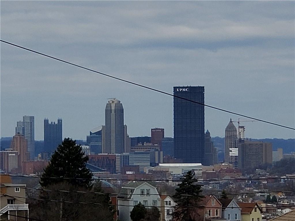905 Deely Street Pittsburgh, PA 15217 - Photo 2 of 19 a view of a city with tall buildings