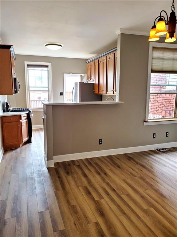 905 Deely Street Pittsburgh, PA 15217 - Photo 8 of 19 a view of empty room with wooden floor and fan
