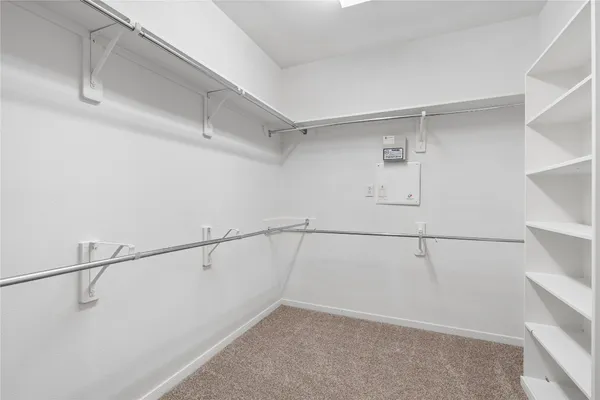 a view of a room with racks on the wall