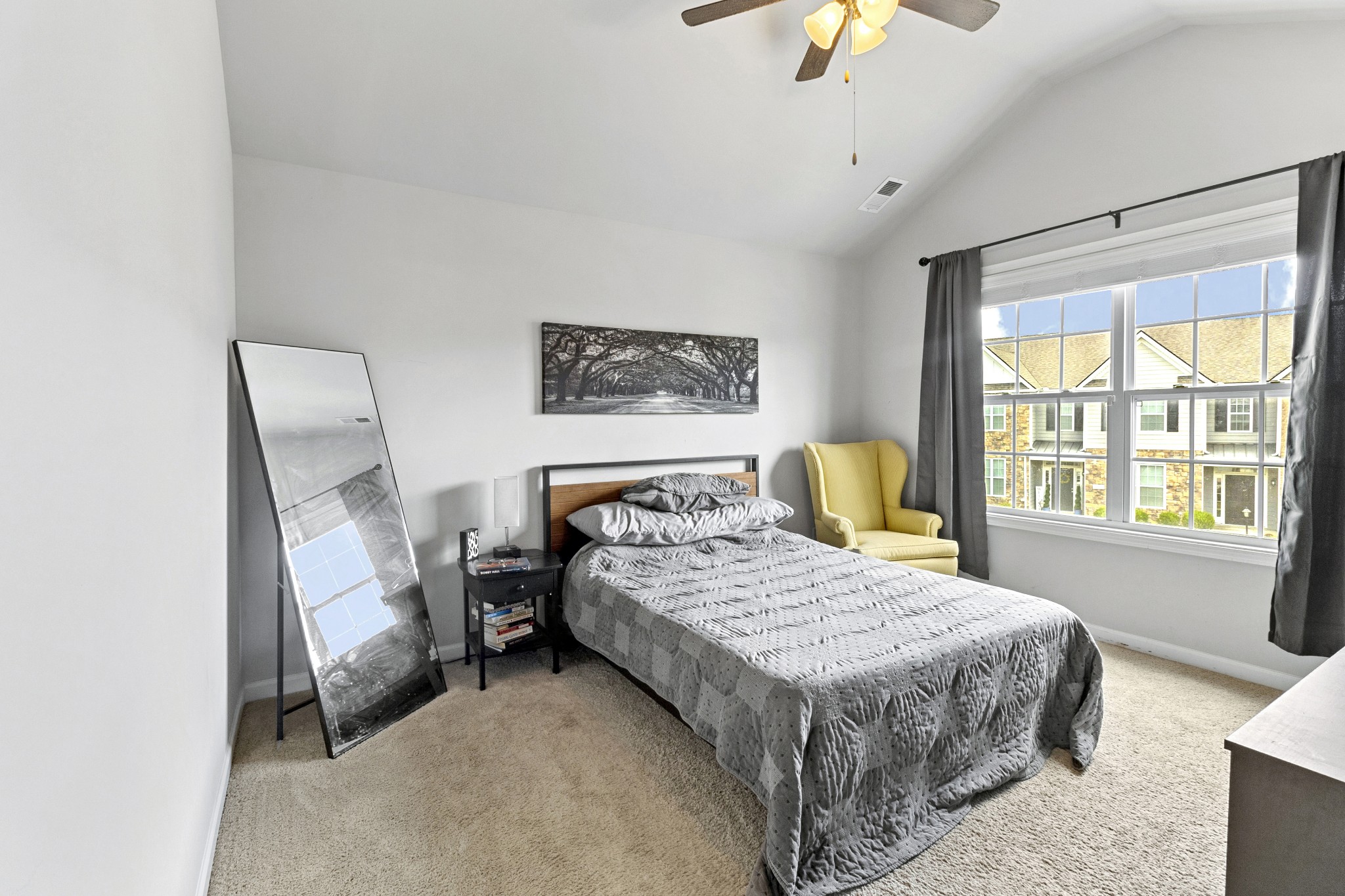 1053 Enclave Avenue Pleasant View, TN 37146 - Photo 12 of 27 a bedroom with a bed a chandelier and a window