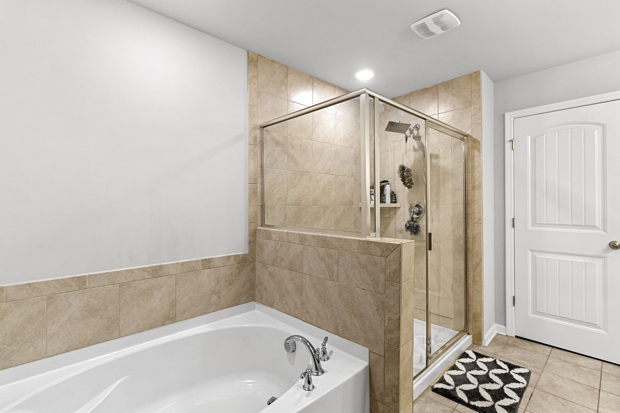 1053 Enclave Avenue Pleasant View, TN 37146 - Photo 15 of 27 a bathroom with a bathtub and a shower