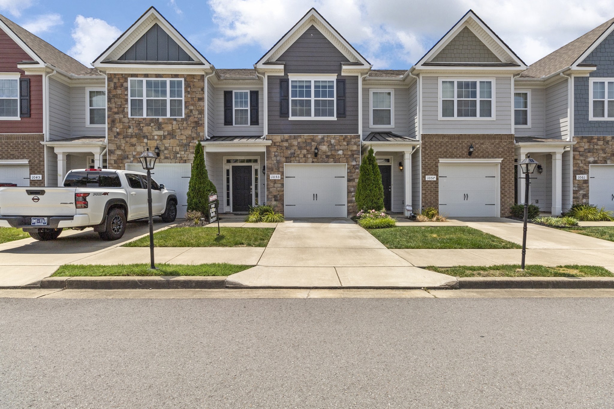 1053 Enclave Avenue Pleasant View, TN 37146 - Photo 27 of 27 a house that has a car parked in front of it