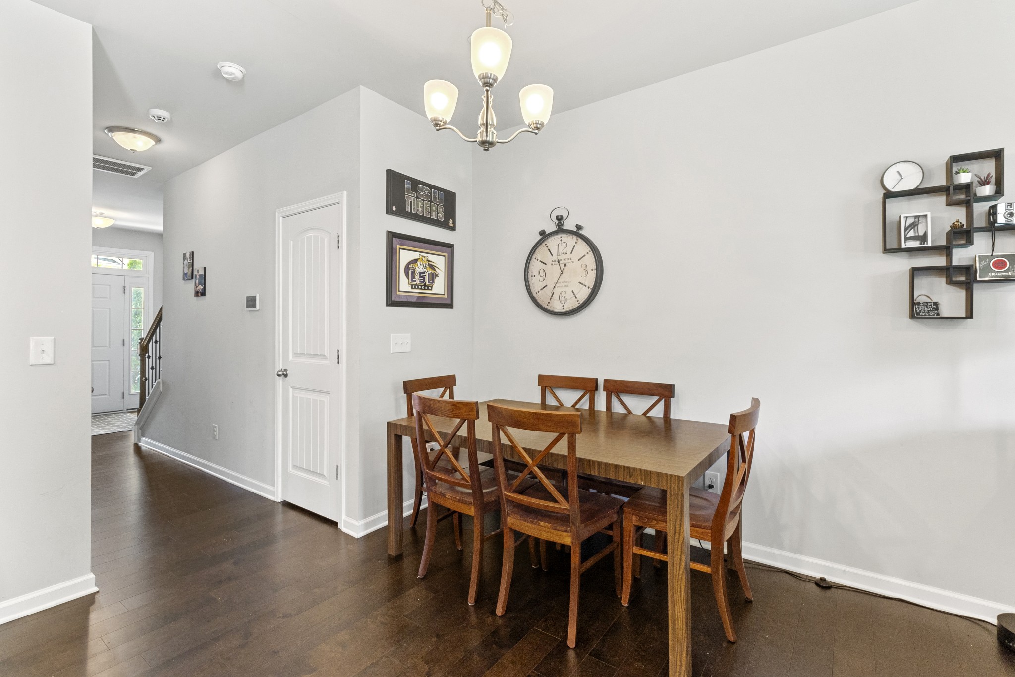 1053 Enclave Avenue Pleasant View, TN 37146 - Photo 10 of 27 a view of a dining room with furniture and a chandelier