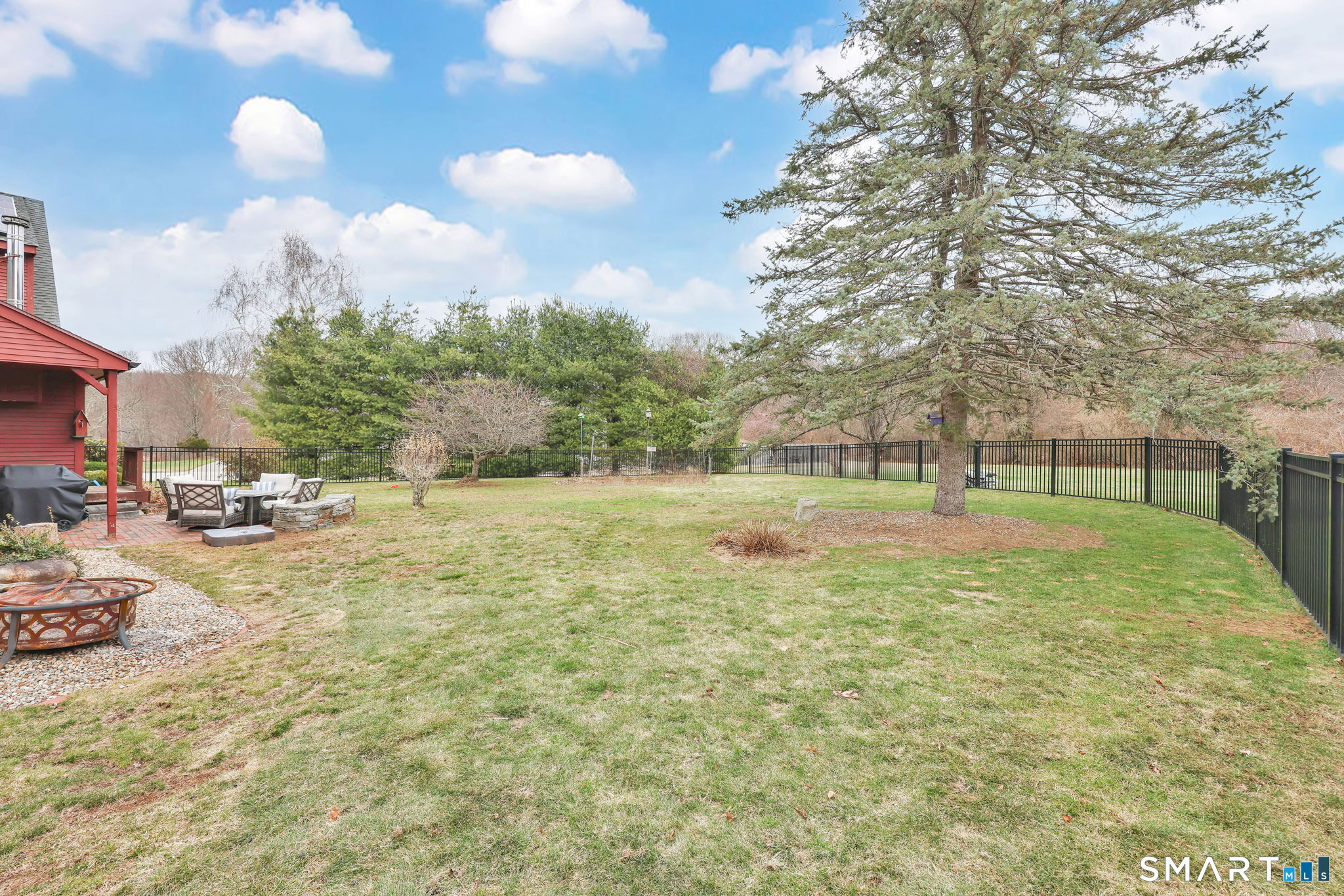 64 Tolland Farms Road Tolland, CT 06084 - Photo 27 of 33 Fenced in Backyard