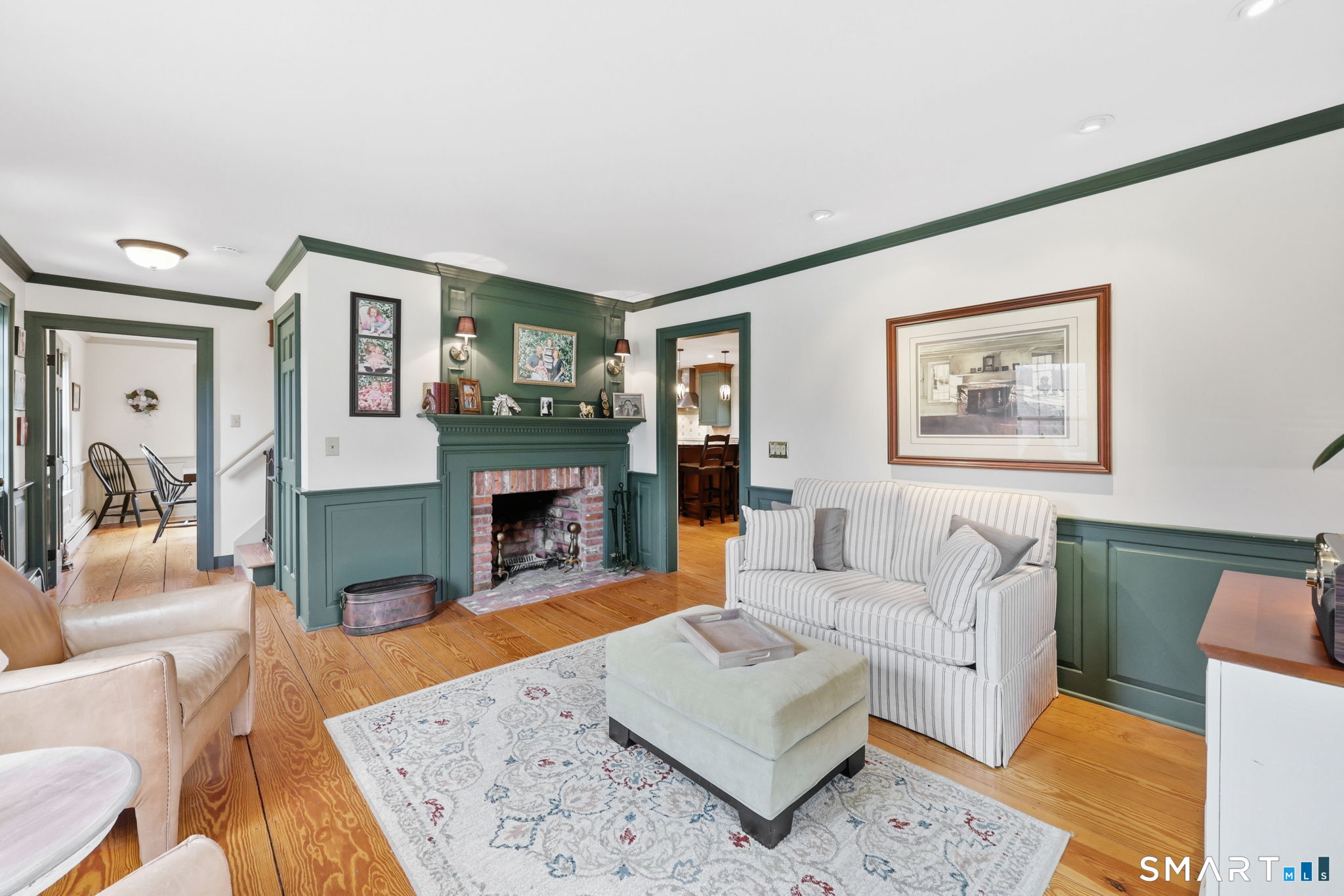 64 Tolland Farms Road Tolland, CT 06084 - Photo 8 of 33 Warm up next to the Fireplace in the Living Room