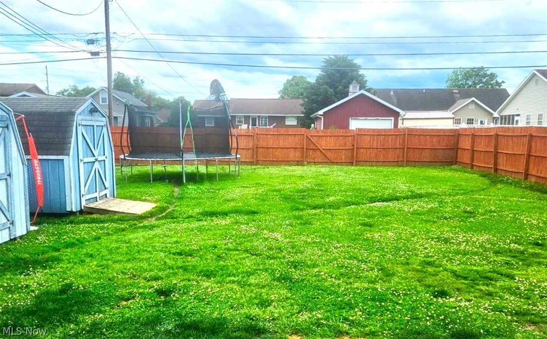 1206 14th Street Vienna, WV 26105 - Photo 24 of 26 Backyard with freshly painted privacy fence