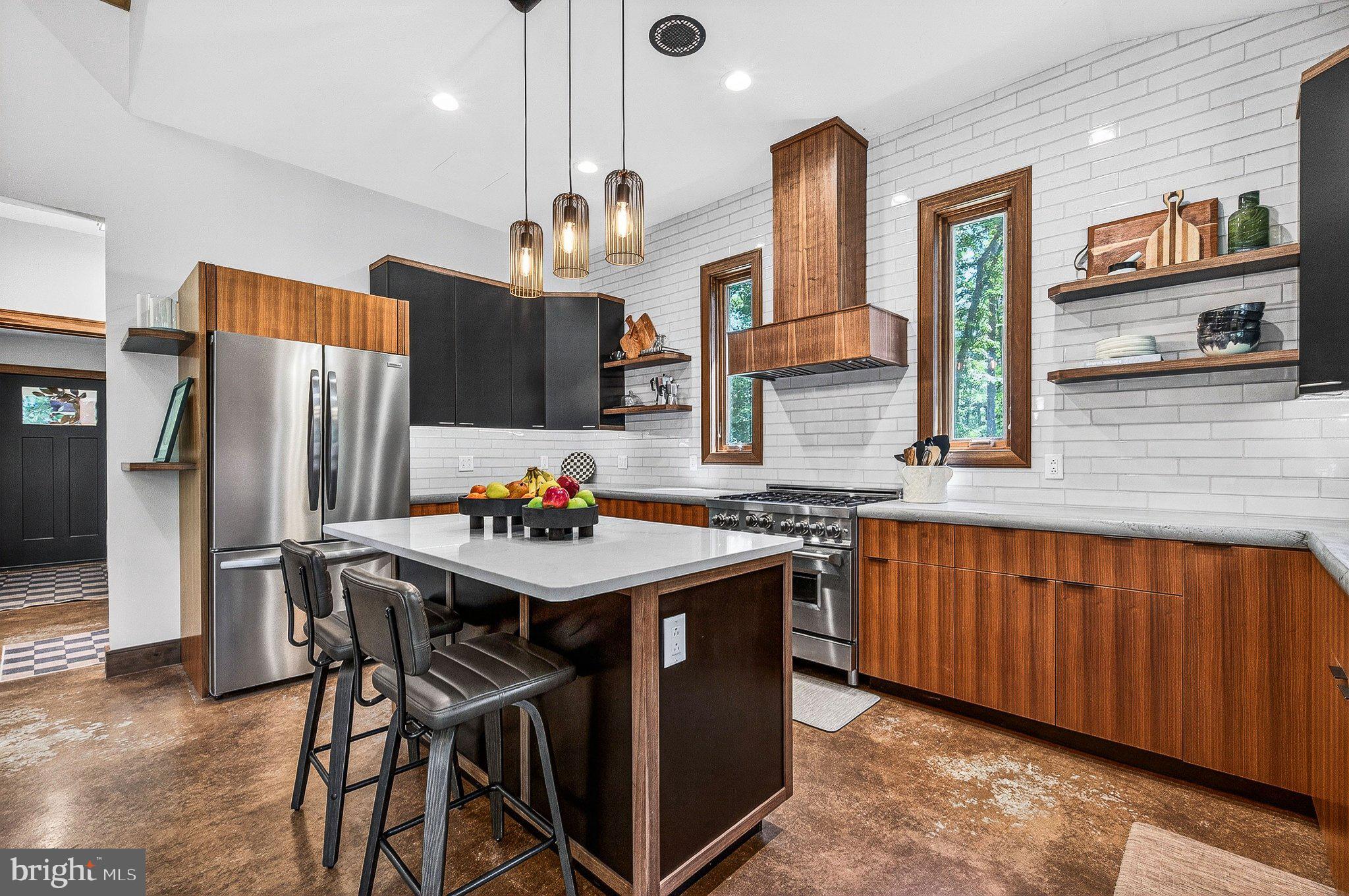 13311 Wilt Store Road Leesburg, VA 20176 - Photo 8 of 64 Modern kitchen with warm wood accents.