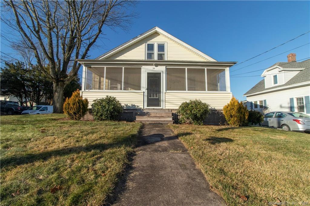 33 Ridge Road Middletown, CT 06457 - Photo 1 of 1 a front view of a house with a yard