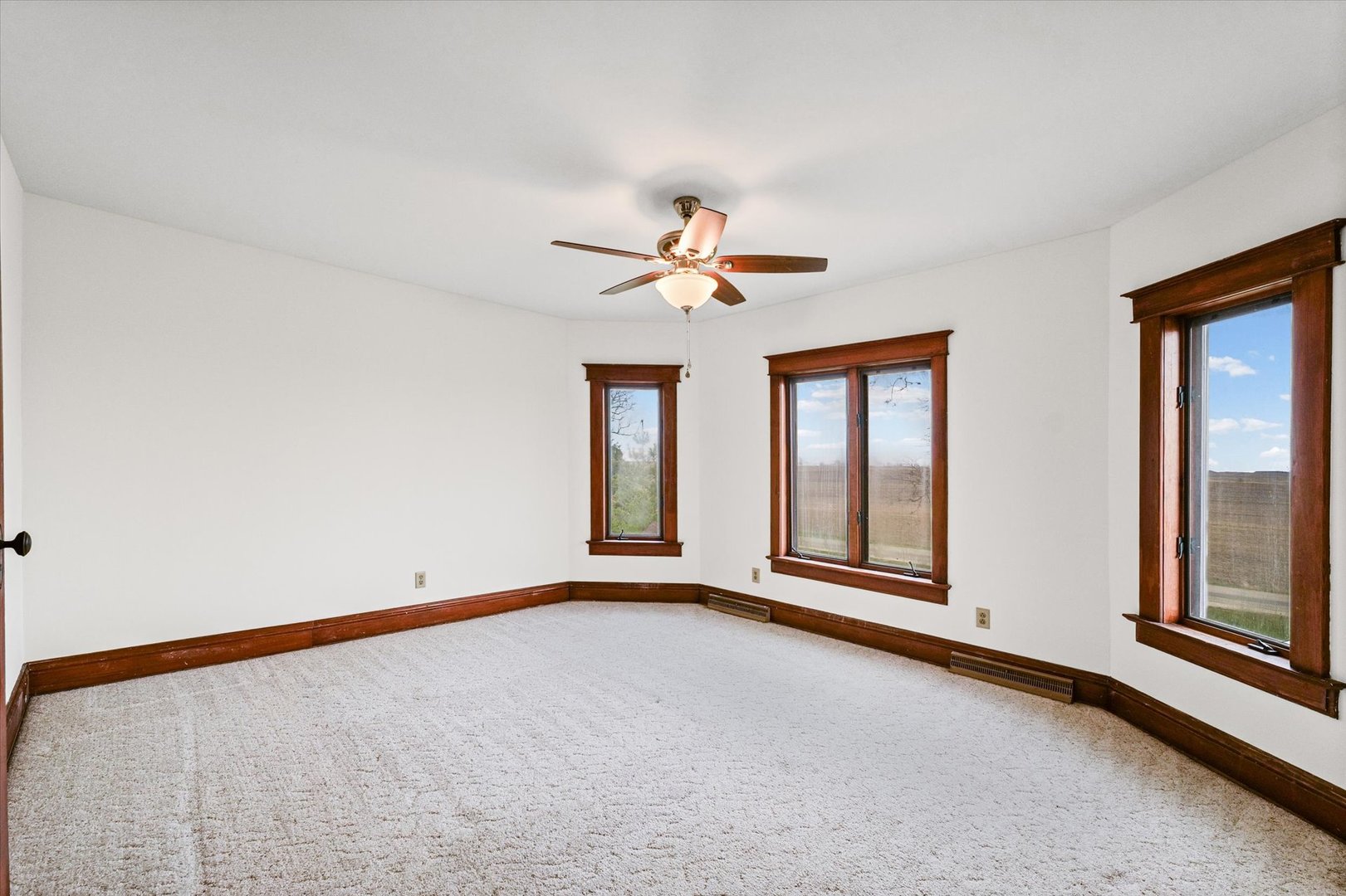 7961 North 3000 E Road Forrest, IL 61741 - Photo 35 of 66 a view of an empty room with chandelier fan