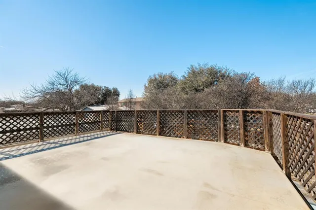 a view of balcony and trees