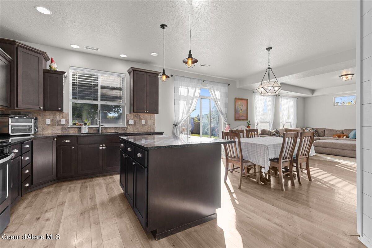 9569 North Prince William Loop Hayden, ID 83835 - Photo 18 of 49 Eat Up Island Bar