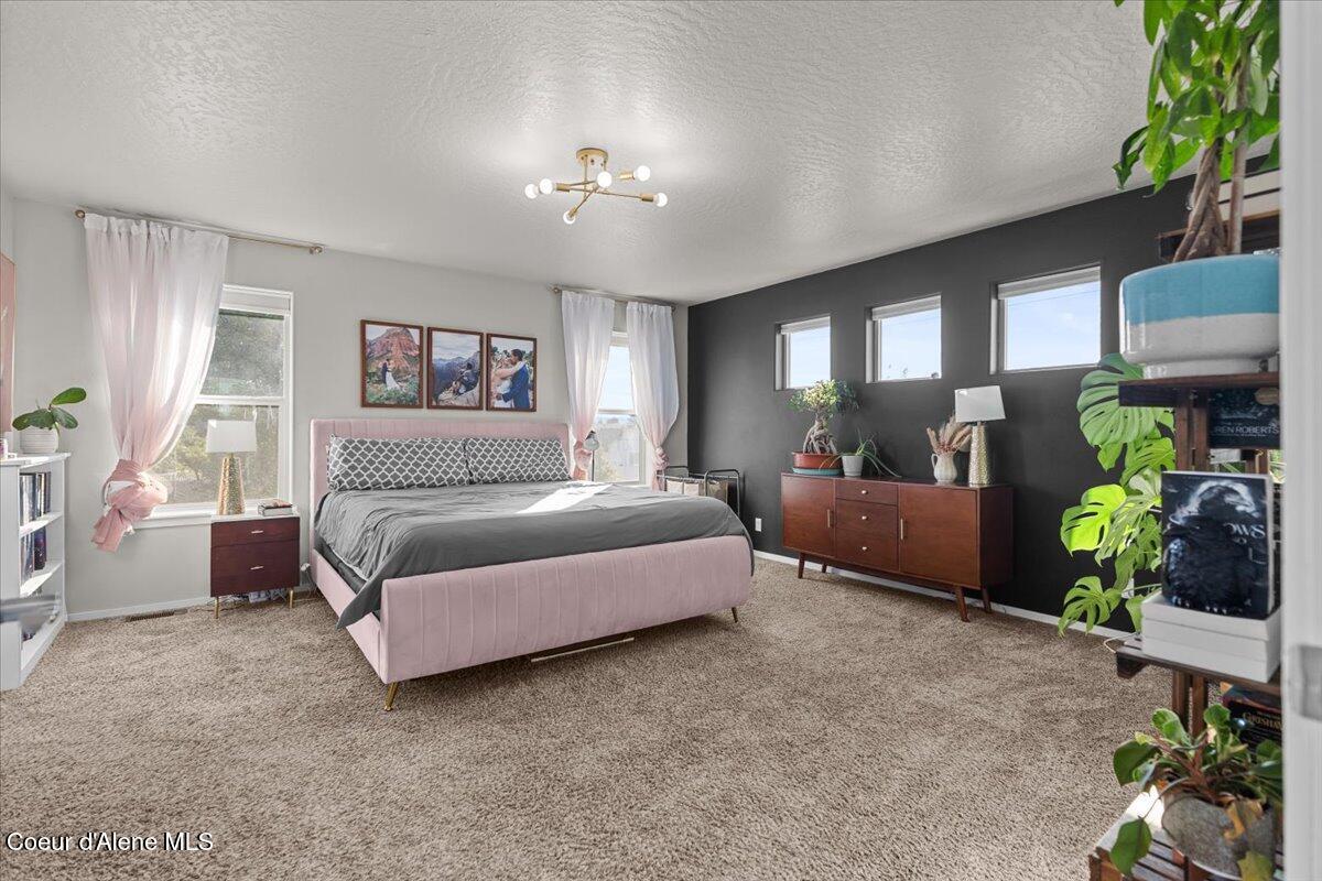 9569 North Prince William Loop Hayden, ID 83835 - Photo 32 of 49 Master Bedroom