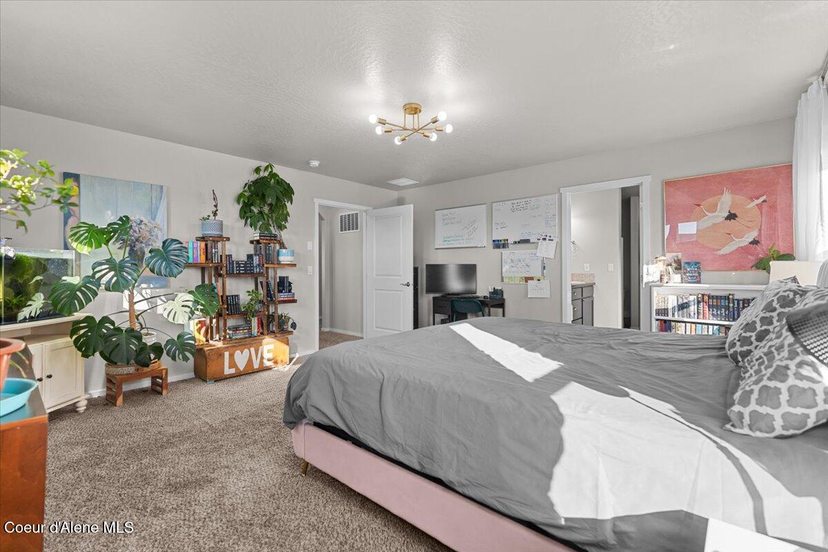 9569 North Prince William Loop Hayden, ID 83835 - Photo 33 of 49 Master Bedroom