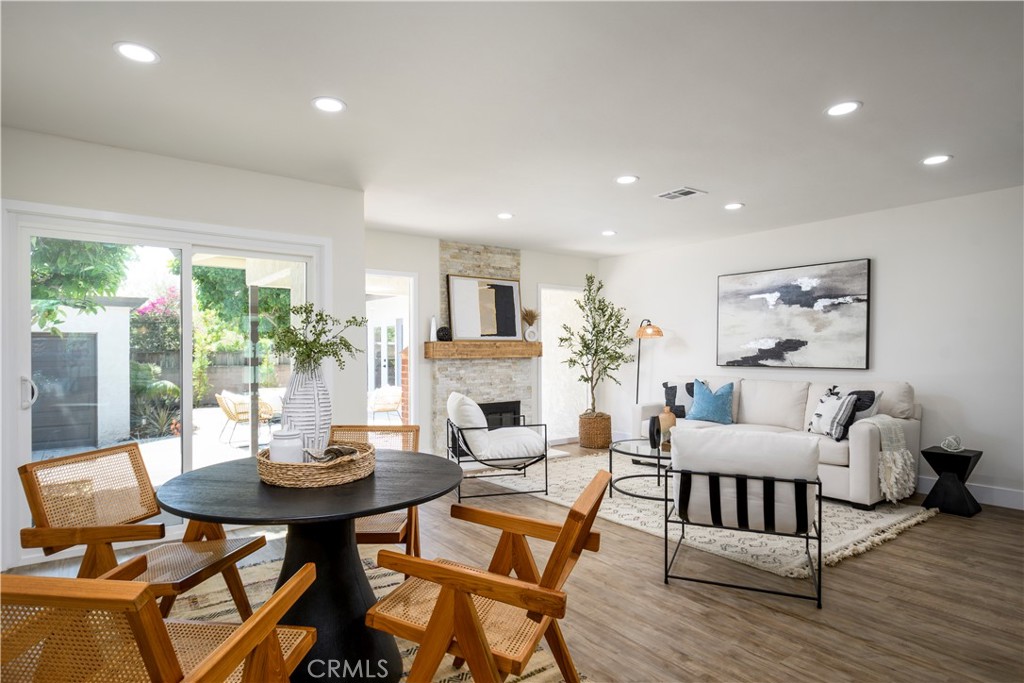 2531 North Studebaker Road Long Beach, CA 90815 - Photo 4 of 34 a view of a dining room with furniture and wooden floor