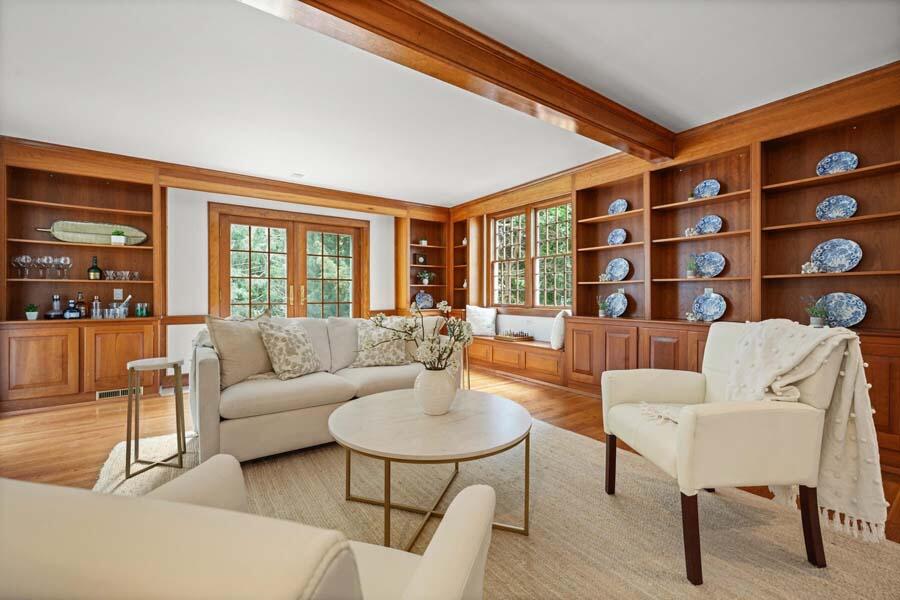 201 Smoke Valley Road Osterville, MA 02655 - Photo 13 of 48 a living room with furniture and a floor to ceiling window