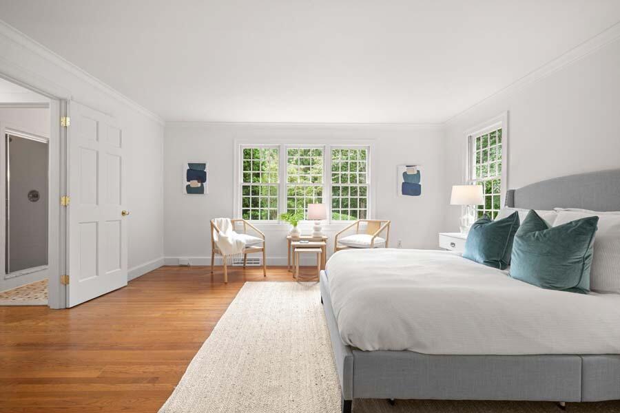201 Smoke Valley Road Osterville, MA 02655 - Photo 24 of 48 a bedroom with a bed and a large window