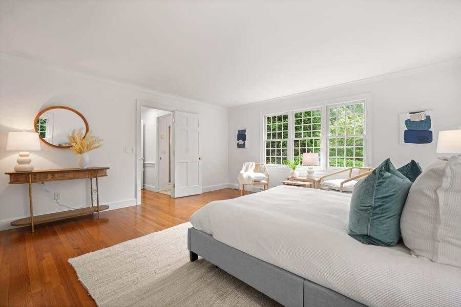 201 Smoke Valley Road Osterville, MA 02655 - Photo 25 of 48 a bedroom with a bed window and dresser