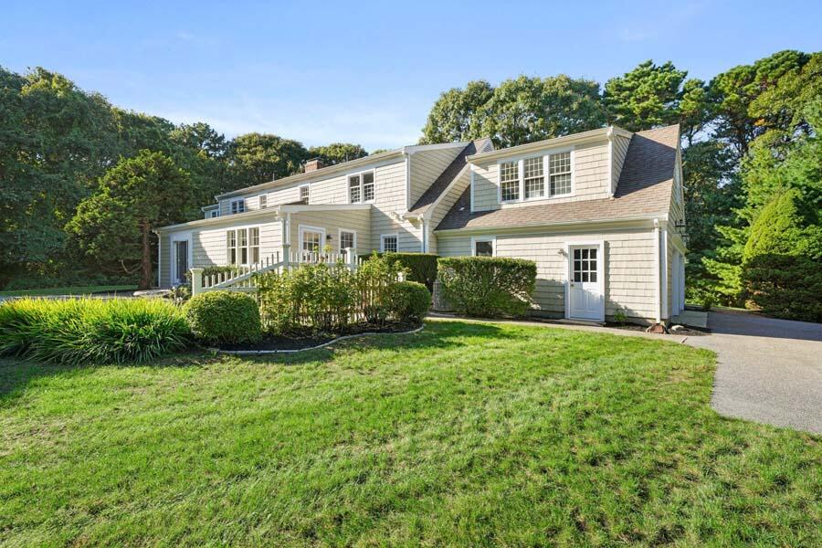 201 Smoke Valley Road Osterville, MA 02655 - Photo 45 of 48 a view of a house with a big yard plants and large trees