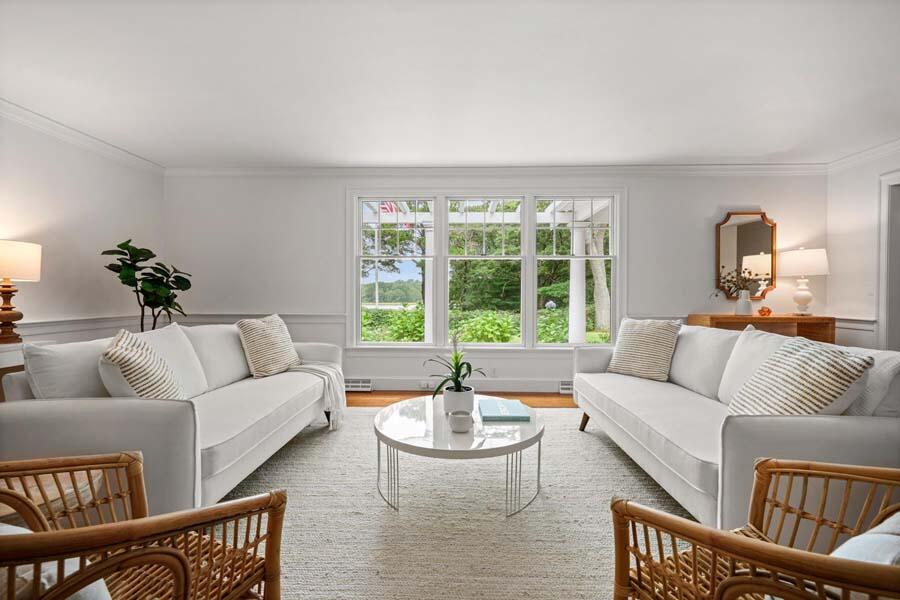 201 Smoke Valley Road Osterville, MA 02655 - Photo 8 of 48 a living room with furniture and a large window