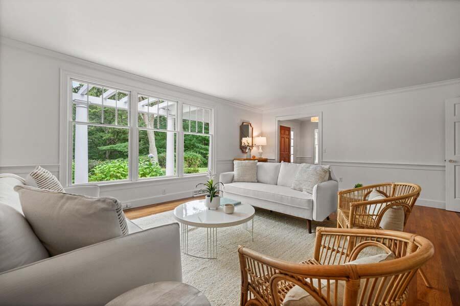 201 Smoke Valley Road Osterville, MA 02655 - Photo 9 of 48 a living room with furniture and a window