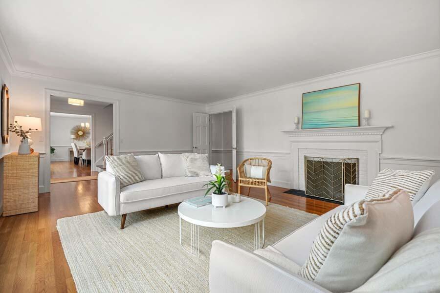 201 Smoke Valley Road Osterville, MA 02655 - Photo 10 of 48 a living room with furniture and a fireplace