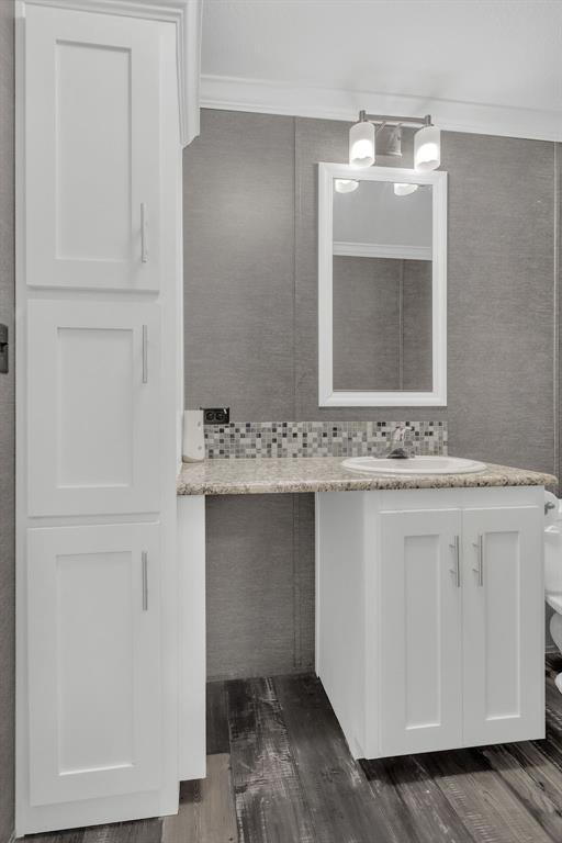 636 Roberson Road Hallsville, TX 75650 - Photo 27 of 36 a bathroom with a sink and a mirror