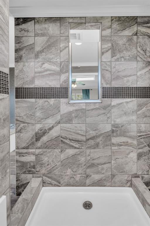 636 Roberson Road Hallsville, TX 75650 - Photo 28 of 36 a bathroom with a bathtub