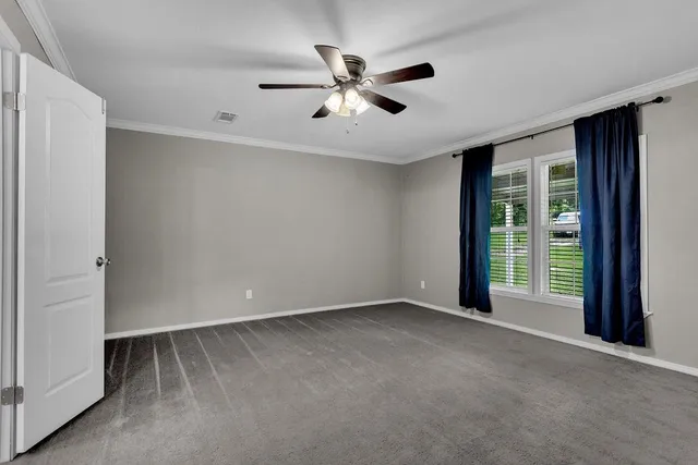 a view of a room with racks on the wall