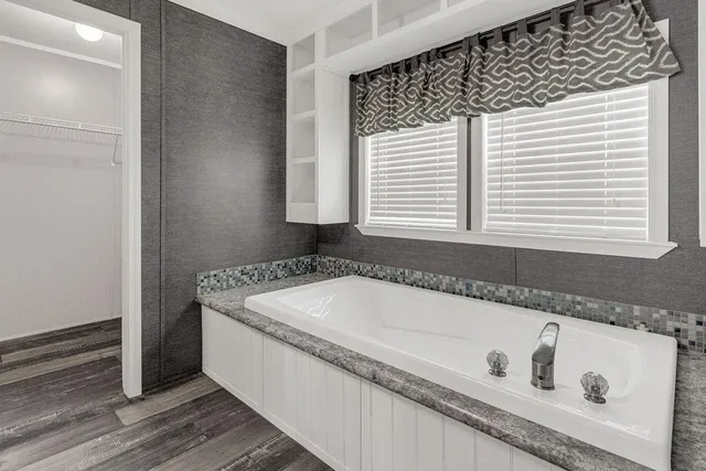 a view of a garden with an ocean