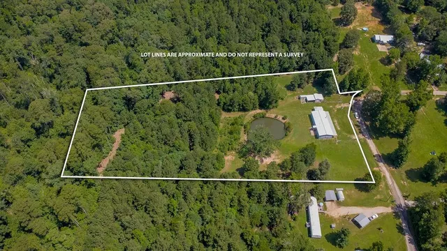 an aerial view of houses with yard